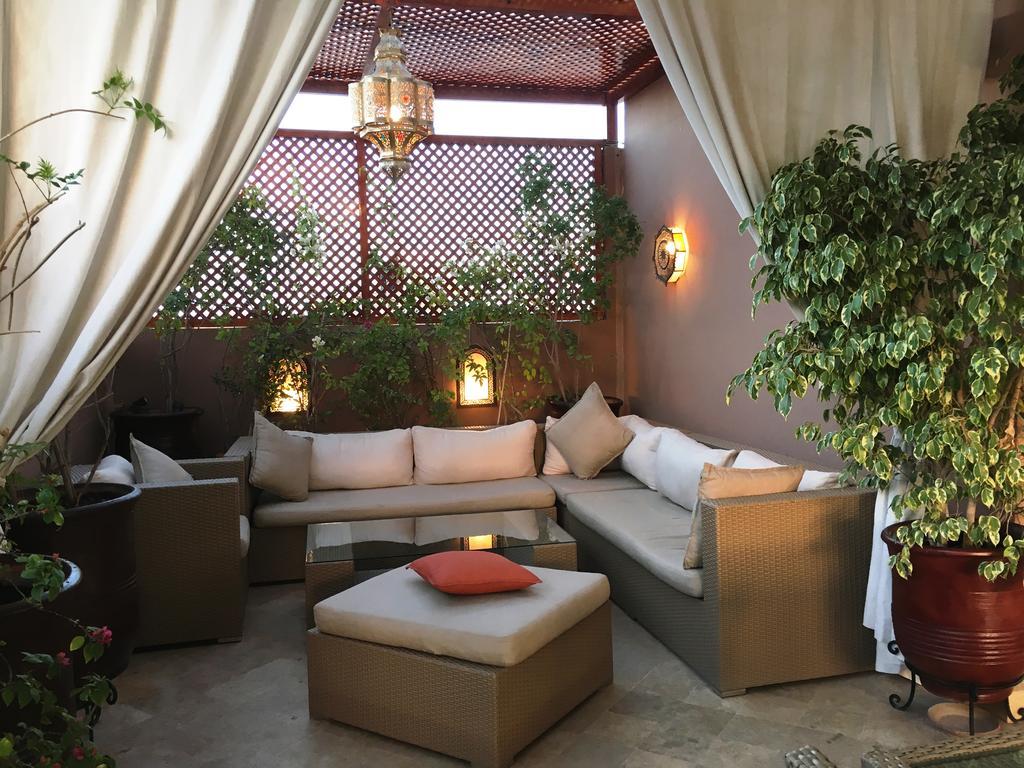 Riad Viva Marrakesh Bagian luar foto A Moroccan patio